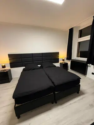 Ein Bett oder Betten in einem Zimmer der Unterkunft Freshly renovated City Apartments Essen KITCHEN WIFI near Düsseldorf Airport