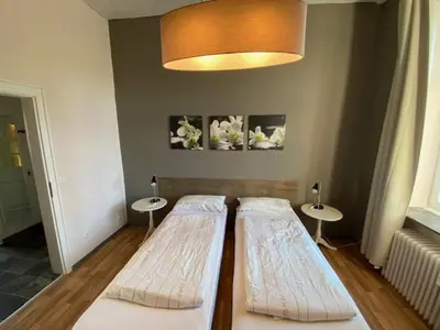 Ein Bett oder Betten in einem Zimmer der Unterkunft Apartments Starlight Hotel Wiesmann
