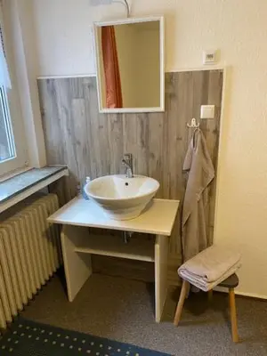 Ein Badezimmer in der Unterkunft Apartments Starlight Hotel Wiesmann