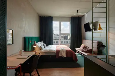 Ein Bett oder Betten in einem Zimmer der Unterkunft Basecamp Hotel Dortmund