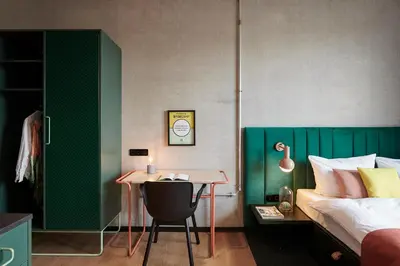 Ein Bett oder Betten in einem Zimmer der Unterkunft Basecamp Hotel Dortmund