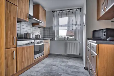 Küche/Küchenzeile in der Unterkunft Maisonette privater Zugang Waschmaschine Parkplatz