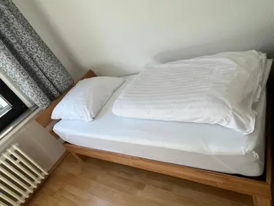 Ein Bett oder Betten in einem Zimmer der Unterkunft Zimmer für Monteure, Handwerker oder Reisende