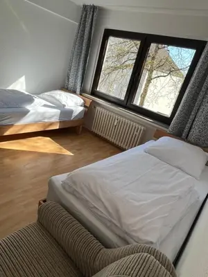 Ein Bett oder Betten in einem Zimmer der Unterkunft Zimmer für Monteure, Handwerker oder Reisende