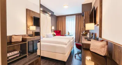 Ein Bett oder Betten in einem Zimmer der Unterkunft PLAZA INN Recklinghausen