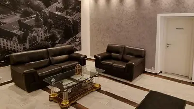 Ein Sitzbereich in der Unterkunft Hotel Linda