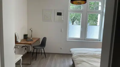 Ein Bett oder Betten in einem Zimmer der Unterkunft JayBnB - Apartment in zentraler Lage zur Dortmunder Innenstadt