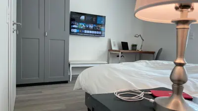 Ein Bett oder Betten in einem Zimmer der Unterkunft JayBnB - Apartment in zentraler Lage zur Dortmunder Innenstadt