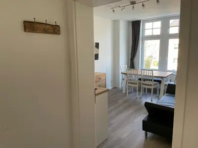 Ein Sitzbereich in der Unterkunft JayBnB - Office Apartment zentral zur Dortmunder Innenstadt