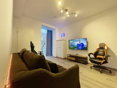 TV/Unterhaltungsangebot in der Unterkunft JayBnB - PS5 55 Zoll 4K TV Gaming Apartment