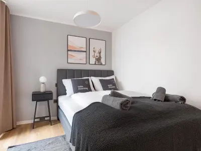 Ein Bett oder Betten in einem Zimmer der Unterkunft Limehome Essen Kettwiger Straße