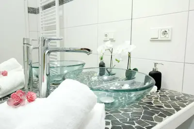 Ein Badezimmer in der Unterkunft superior Apartment mit WiFi l 400m bis Uni l Messe l IGA 27 l Zoo Dui