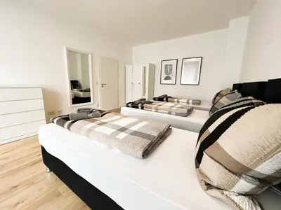 Ein Bett oder Betten in einem Zimmer der Unterkunft Centerapartments Premium DeLuxe