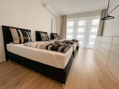 Ein Bett oder Betten in einem Zimmer der Unterkunft Centerapartments Premium DeLuxe