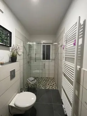 Ein Badezimmer in der Unterkunft Heimathafen Crange