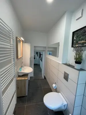 Ein Badezimmer in der Unterkunft Heimathafen Crange