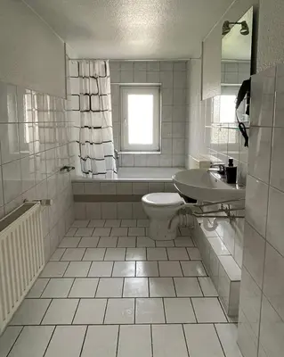 Ein Badezimmer in der Unterkunft Monteur Appartement with six Beds and six Guests