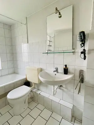 Ein Badezimmer in der Unterkunft Monteur Appartement with six Beds and six Guests