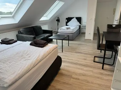 Ein Bett oder Betten in einem Zimmer der Unterkunft Ferienwohnung Apartment Essen - Free Parking - WiFi - Kitchen