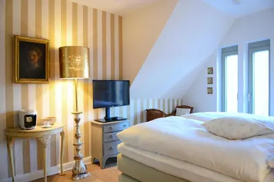 Ein Bett oder Betten in einem Zimmer der Unterkunft Hotel No. 11