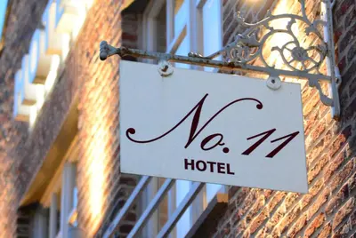 Ein Zertifikat, Auszeichnung, Logo oder anderes Dokument, das in der Unterkunft Hotel No. 11 ausgestellt ist