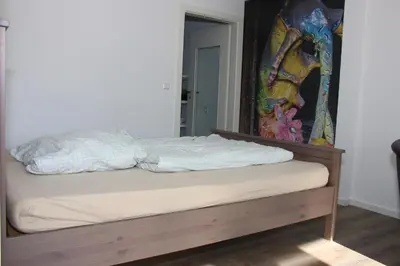 Ein Bett oder Betten in einem Zimmer der Unterkunft FeWo TIMON großzügig modern mit Terrasse ca 50 qm