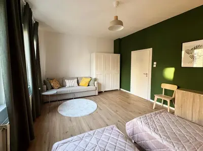 Ein Bett oder Betten in einem Zimmer der Unterkunft Big apartment with Parking, 30 min to Düsseldorf