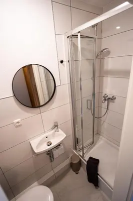 Ein Badezimmer in der Unterkunft Hotel Garni Moers