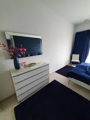 Ein Bett oder Betten in einem Zimmer der Unterkunft Phönixsee - Studio mit Küche, Bad und Dachterrasse