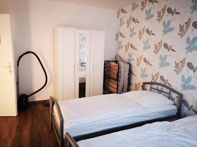 Ein Bett oder Betten in einem Zimmer der Unterkunft POLAT Apartments 1