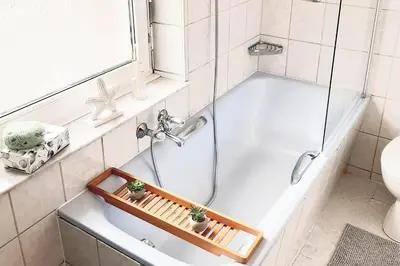 Ein Badezimmer in der Unterkunft CosyHomes24 - Workers apartment with parking space - VE01