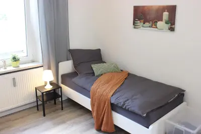 Ein Bett oder Betten in einem Zimmer der Unterkunft CosyHomes24 - Workers apartment with parking space - VE01
