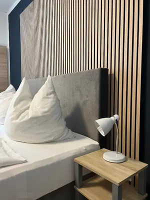 Ein Bett oder Betten in einem Zimmer der Unterkunft Hotel Monopol