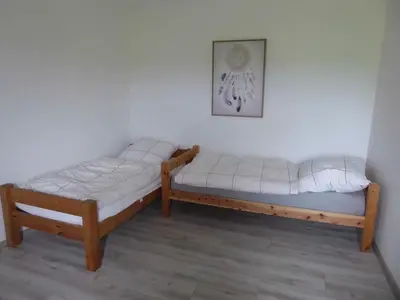 Ein Bett oder Betten in einem Zimmer der Unterkunft Ferienwohnung Ruhepunkt