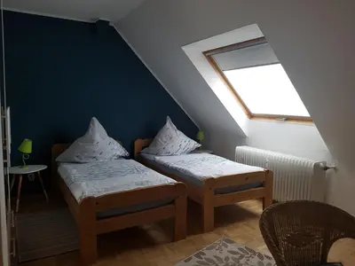 Ein Bett oder Betten in einem Zimmer der Unterkunft 3 x Ferien- & Monteurwohnungen Koenen nah am Westfield Centro
