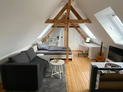 Ein Sitzbereich in der Unterkunft Messeapartment Stockum