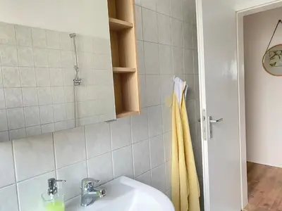 Ein Badezimmer in der Unterkunft SOMMER GARTEN neben Hbf Duisburg