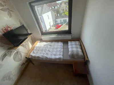 Ein Bett oder Betten in einem Zimmer der Unterkunft Monteurwohnungen-Dinslaken