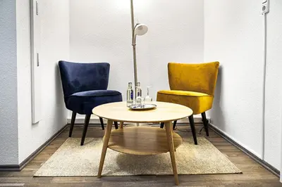 Ein Sitzbereich in der Unterkunft Hotel Kronenkurve