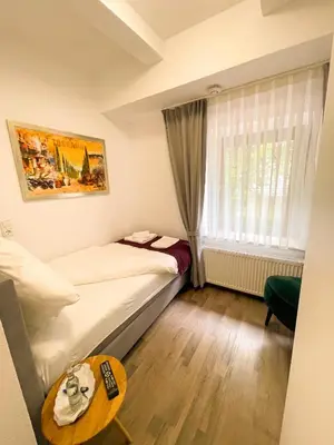 Ein Bett oder Betten in einem Zimmer der Unterkunft Hotel Kronenkurve