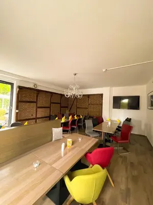 Ein Sitzbereich in der Unterkunft Hotel Kronenkurve