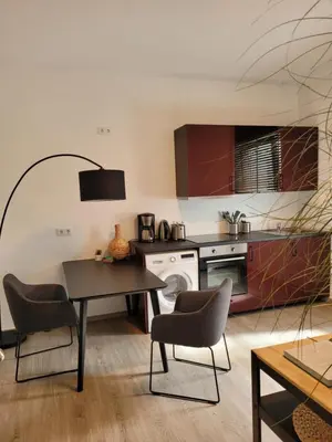 Ein Sitzbereich in der Unterkunft Waldstadt-Apartments