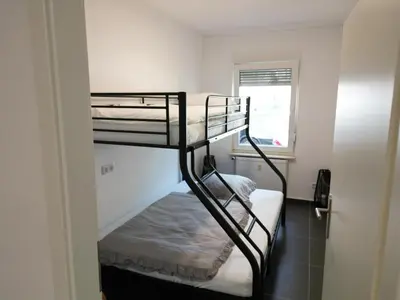 Ein Bett oder Betten in einem Zimmer der Unterkunft Apartment HomeBo