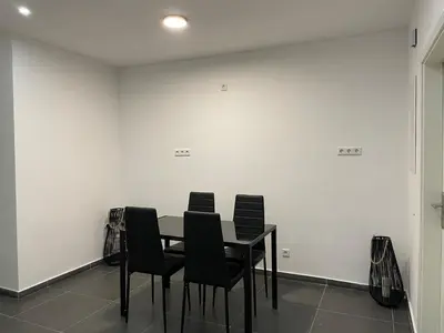Der Geschäftsbereich oder Konferenzraum in der Unterkunft Apartment HomeBo