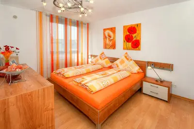 Ein Bett oder Betten in einem Zimmer der Unterkunft Business Suiten
