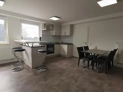 Küche/Küchenzeile in der Unterkunft Moderne Wohnung mit Terrasse und eigenem Zugang.