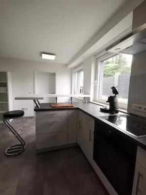 Küche/Küchenzeile in der Unterkunft Moderne Wohnung mit Terrasse und eigenem Zugang.