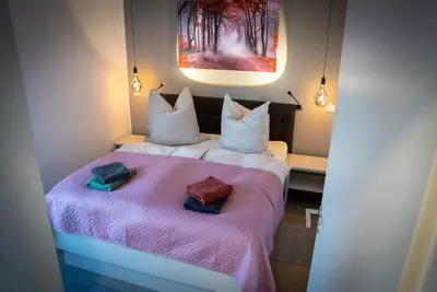 Ein Bett oder Betten in einem Zimmer der Unterkunft Ferien an der Eiche