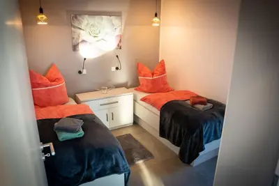 Ein Bett oder Betten in einem Zimmer der Unterkunft Ferien an der Eiche