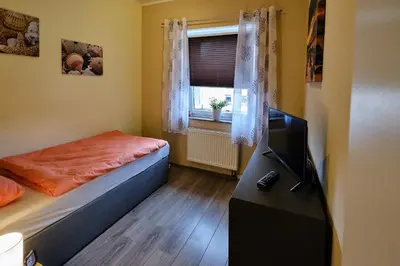 Ein Bett oder Betten in einem Zimmer der Unterkunft Ferienwohnung Mitten im Pott